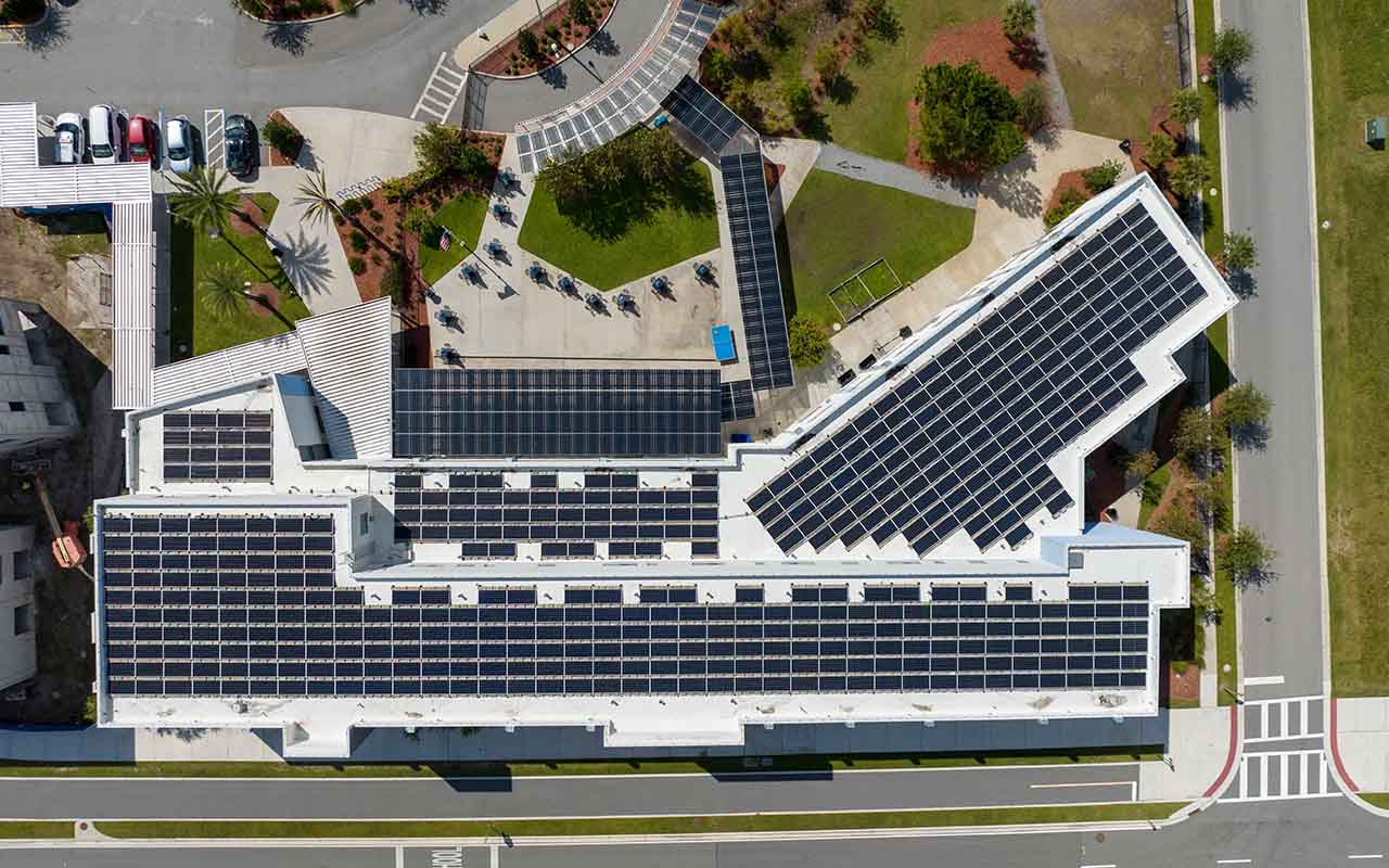 Project-4 NeoCity's goal is to create a sustainable future by installing solar panels on the roof of their buildings.